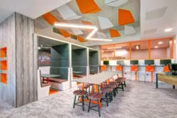a contemporary school staffroom design with dining furniture and chill out booths