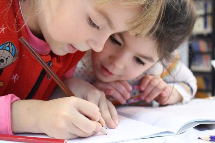 school children writing