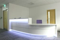 Crowe UK in Kent: Office Reception Desk with LED Lighting Installed by Rap Interiors