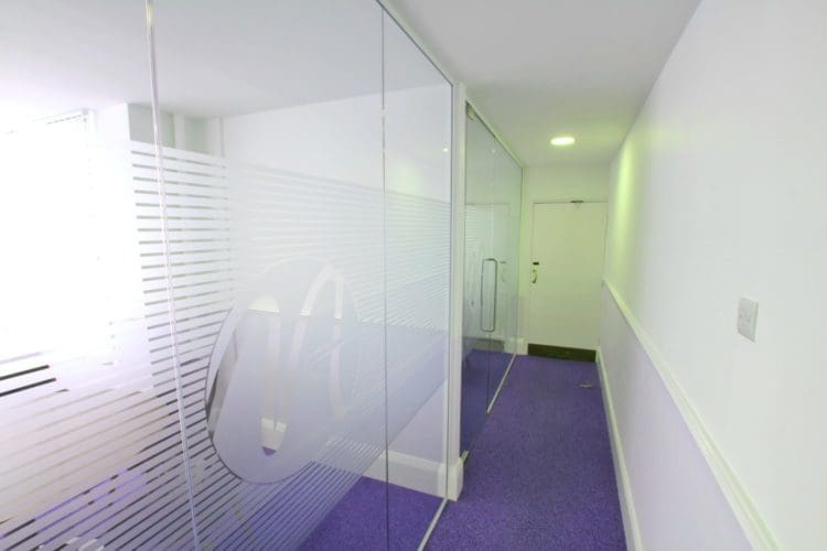 Commercial office design with glass-fronted meeting rooms