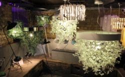 lights made out of synthetic leaves for a nature themed office interior design scheme