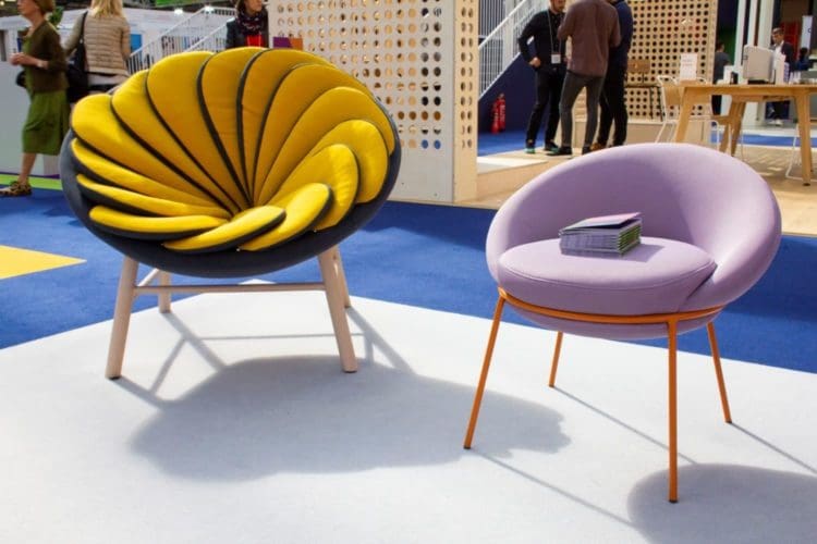a chair with 14 overlapping pillows designed by missana
