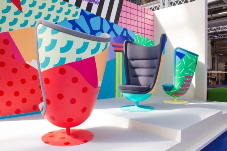 colourful swivel chairs on display at 100 percent design london 2018