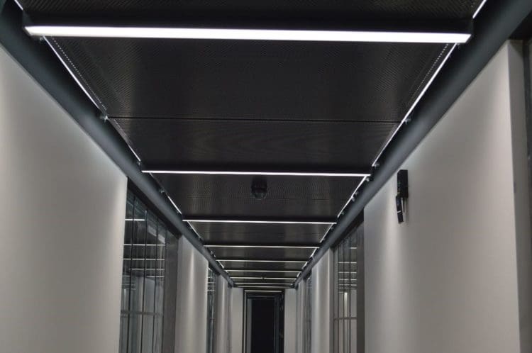 the results a corridor office fit out with downlights and LED panels