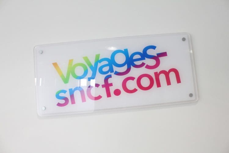 Company Sign for Voyages sncf Installed by Kent Fit Out Company Rap Interiors