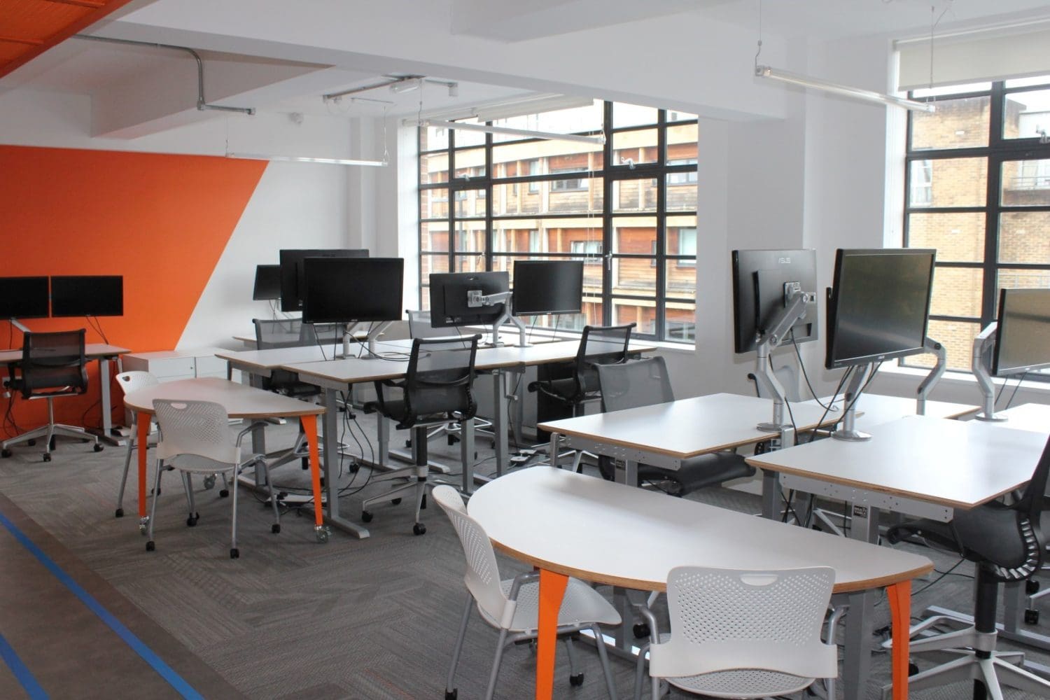 Modern Office Fit Out with Desks and Chairs at Hudl London