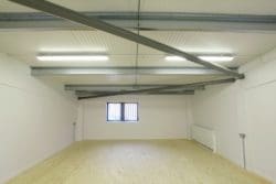 a college construction classroom with an oriented strand board floor