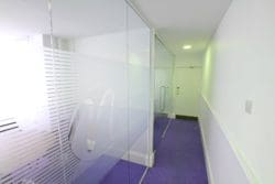 Office Fit Out in Kent with Glass Fronted Meeting Rooms and Company Logo Manifestation