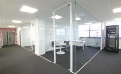 Director's Office Design and Fit Out with Glass Walls and Meeting Table — Rap Interiors