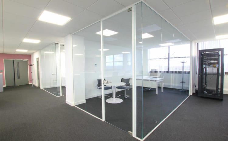 Director's Office Design and Fit Out with Glass Walls and Meeting Table — Rap Interiors