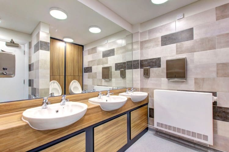 Latymer Upper School: School toilet design and refurbishment with tiles and urinals