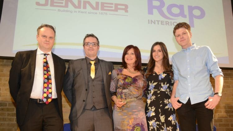 construction project of the year finalists rap interiors collecting an award for a dynamic office space design