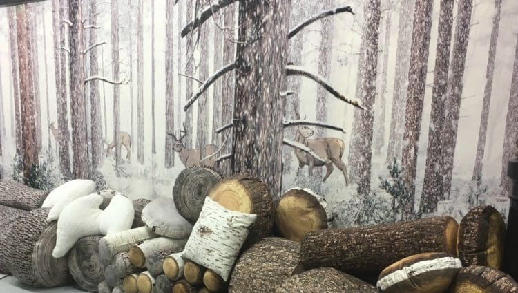 Faux winter office interior design displayed at one hundred percent design