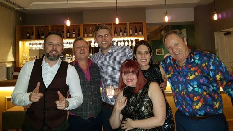 members of interior fit out company rap interiors celebrating at the office christmas party