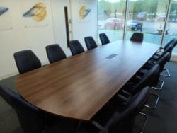 Modern Office Meeting Room Interior Design with a Shared Desk and New Carpet Tiles