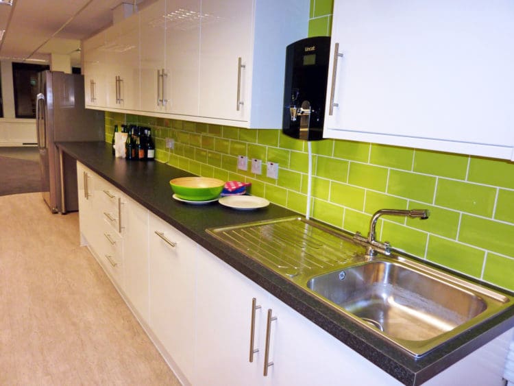 Office Kitchen Design with Tiles and Storage Solutions