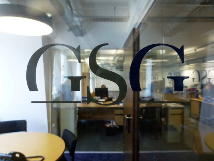 Glass Partition Manifestation with the Globetec Solutions Company Logo