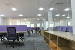 Refurbished Office Interiors in Kent with Glass Meeting Rooms and Shared Furniture Solutions