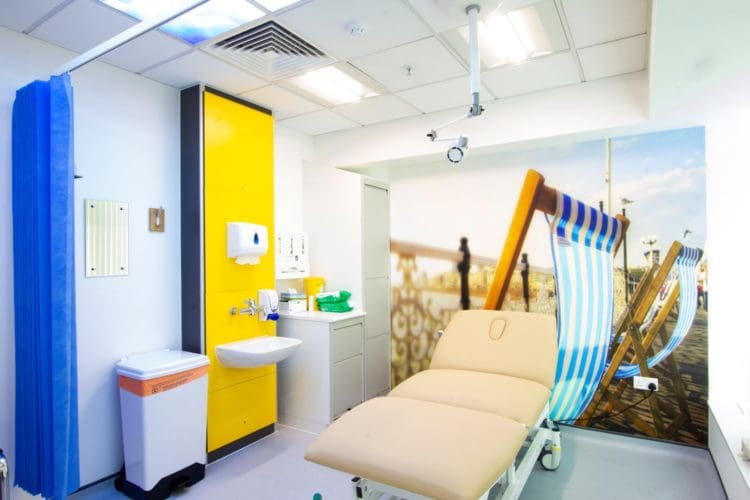 surgery healthcare interior design with a treatment table and sanitary ware