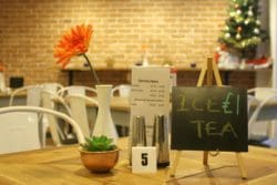 College Cafe Interior Design with Dining Furniture and Condiments