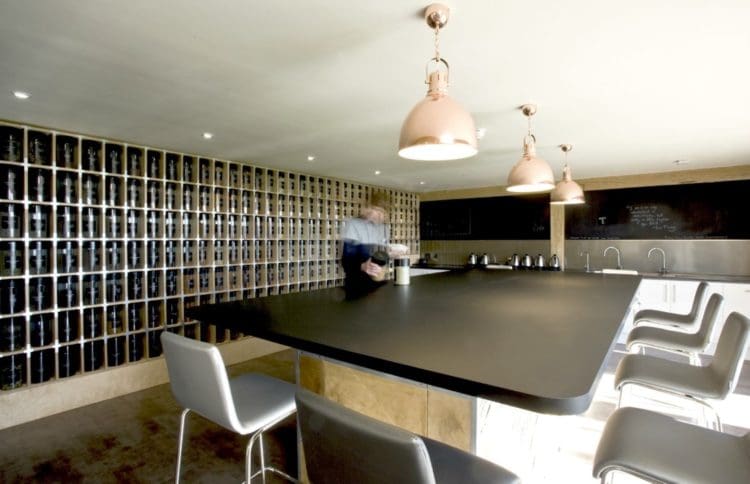 tea blending room with bespoke storage wall designed by a fit out company from london