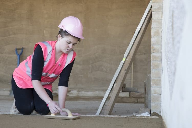 woman and young people in construction