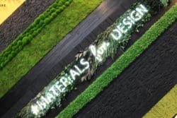 A living moss wall with charred material by Innerspace Cheshire