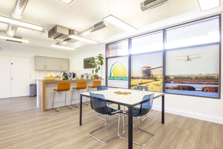 Office breakout room design with a breakfast bar