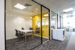 Office meeting room refurbishment in London with a seamless glass partition