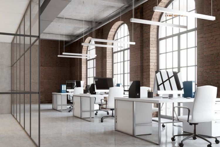 An industrial style exposed ceiling: one of our office design trends for 2020