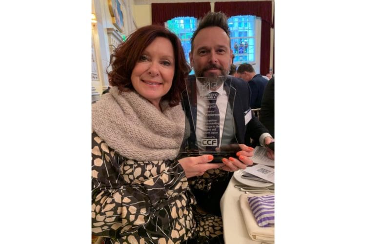 Julie Anderson with Martyn Pilcher and her Lifetime Achievement award