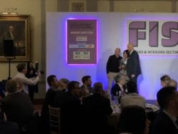 Rap Interiors Design Director Julie Anderson picking up an award at the FIS awards