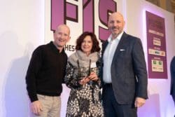 Rap Interiors Design Director collecting an award at the FIS awards