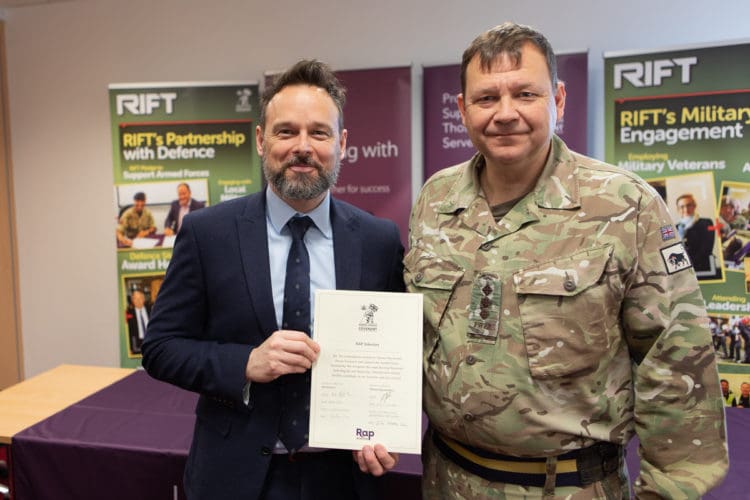 Martyn Pilcher and Captain Dean Goldsmith with a signed Military Covenant certificate