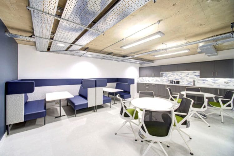 Office Breakout Area Design With Booths And Dining Tables