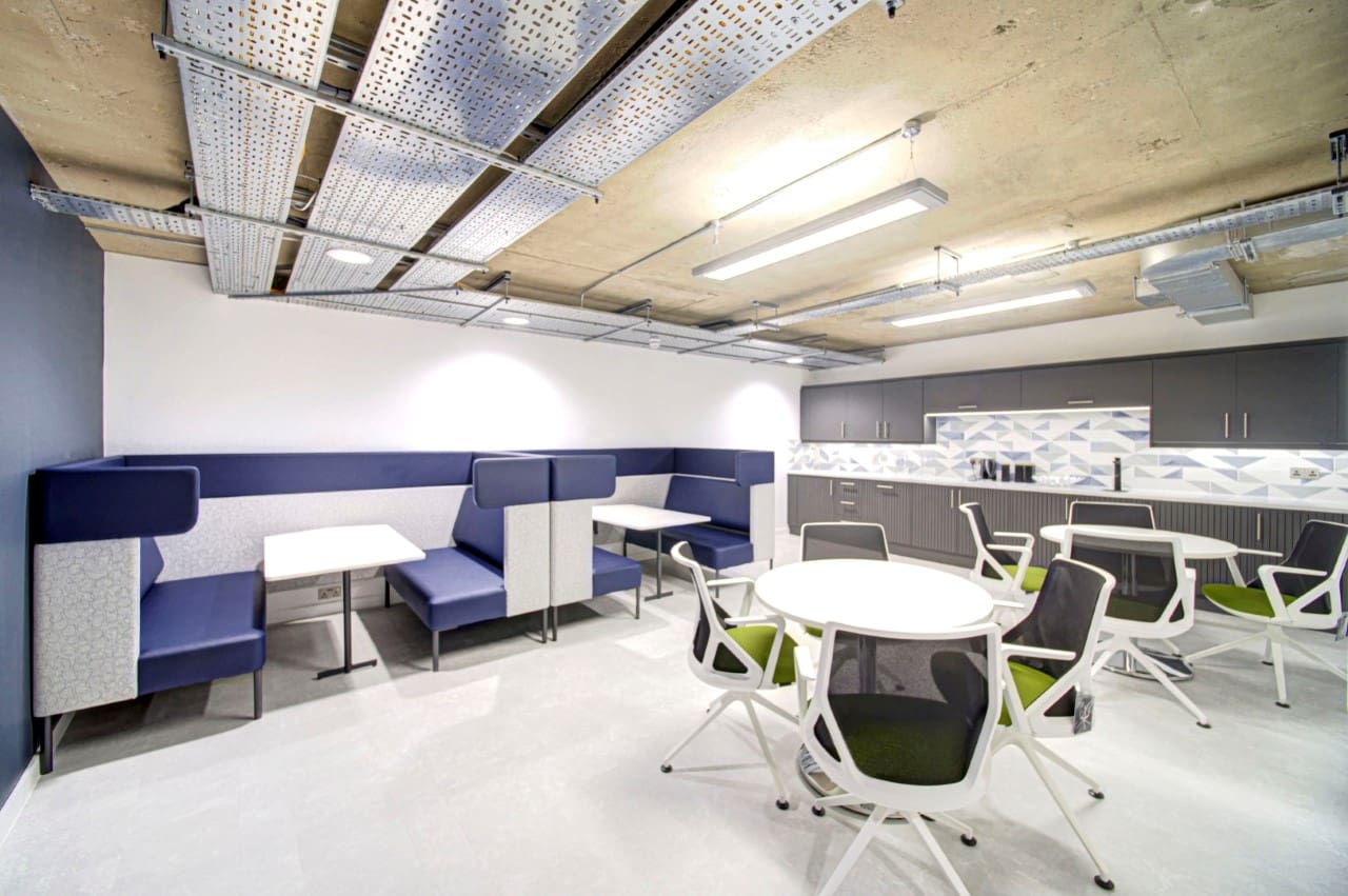 Office Breakout Area Design With Booths And Dining Tables