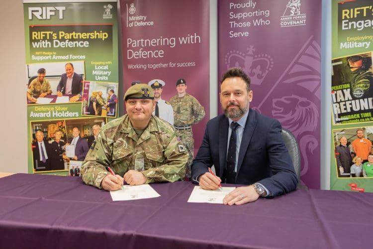 Rap Interiors Commercial Director Martyn Pilcher signing a Military Covenant
