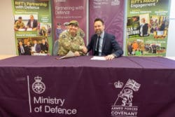 Rap Interiors Commercial Director shaking hands with Major Tony Panayi at a Military Covenant signing