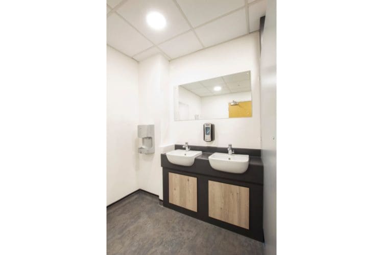 Warehouse toilet refurbishment with new sinks and sanitary ware