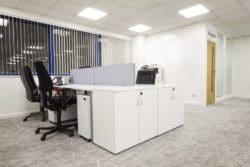 White office desk installed for a refurbishment project in Brighton
