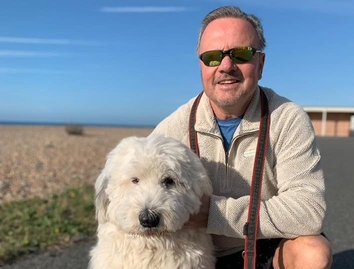 Director Rick and Office Dog Otis Stress Free at the beach