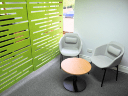 A collaborative meeting space with office furniture