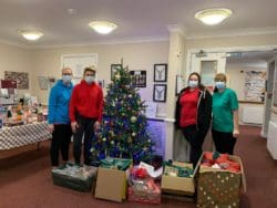 Ashley Gardens Care Home staff with Christmas presents