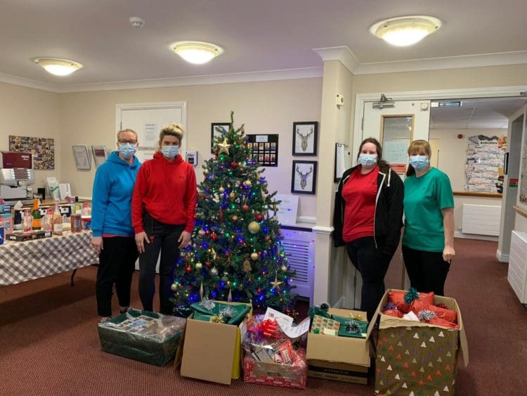 Ashley Gardens Care Home staff with Christmas presents