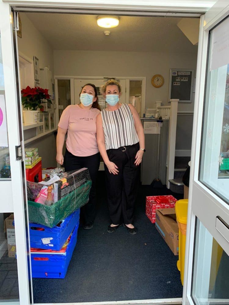 Betsy Clara Care Home recieving their Christmas presents
