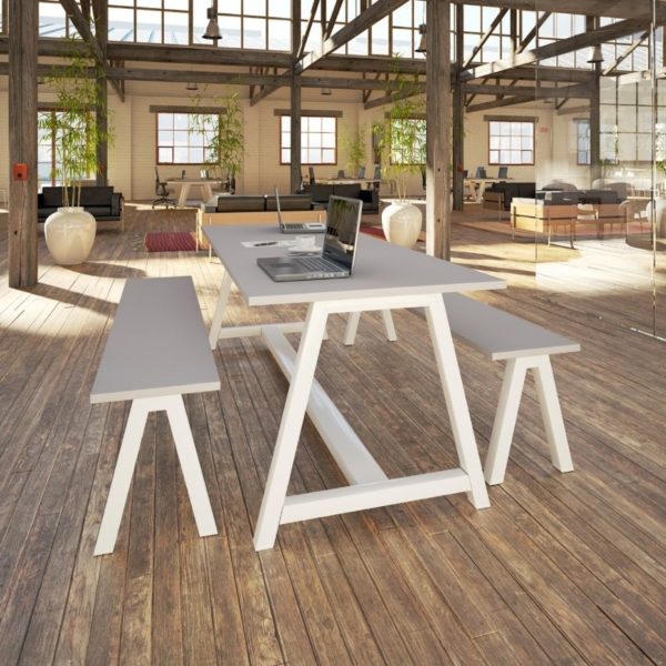 Gianni breakout table with matching benches in white for a large open plan breakout space in an office environment