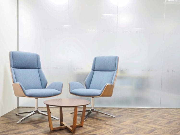 Chairs and coffee table for an office reception waiting area