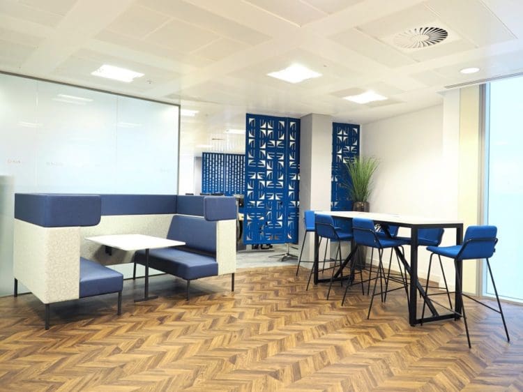 Office refurbishment with booths and a poseur table for Arch Insurance in London