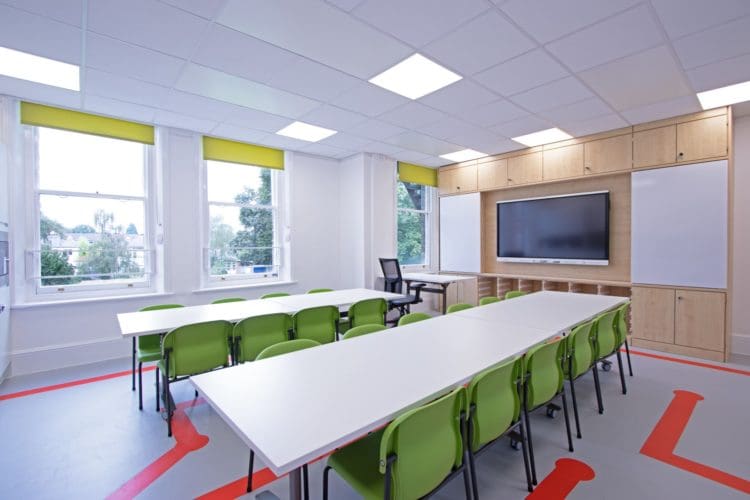 School classroom design with storage wall and presentation screen