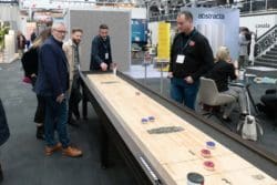 Shuffleboard office game on display at the Workspace Design Show